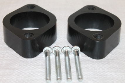 Nissan note увеличение клиренса. Проставки ниссан марч. Проставки на ниссан ноут. Ниссан тиида проставки передние 20 мм. Проставки ниссан марч.